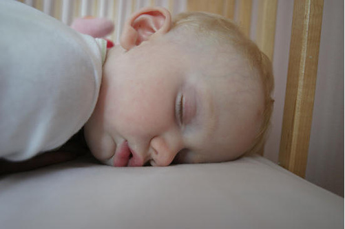 Baby on Crib Mattress
